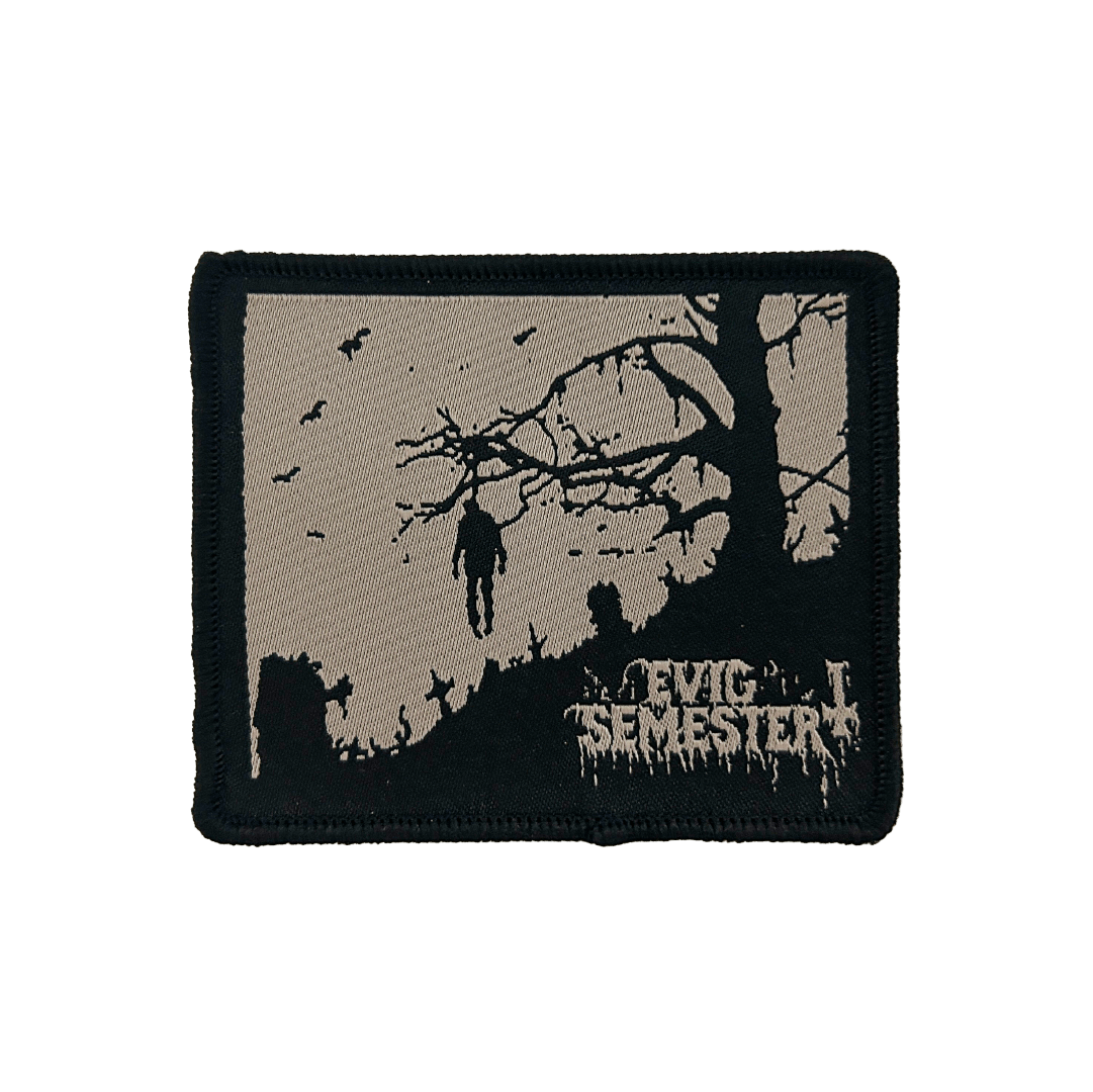 Evig semester – tygmärke